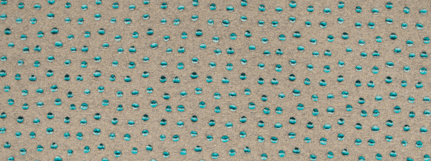 Beige textured fabric with small teal teardrop dots in a regular grid.