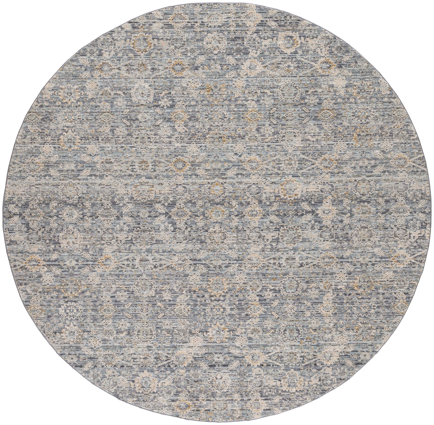 Round blue-gray rug with distressed vintage pattern of ivory floral medallions, soft and ornate.