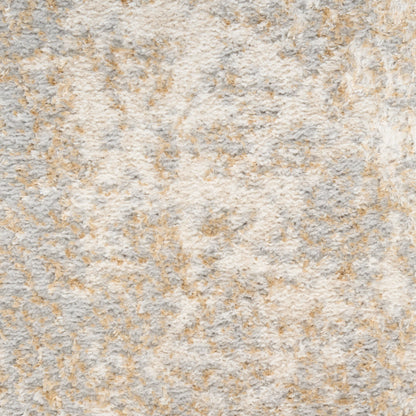 Close-up of rough beige-gray stone texture with cream and tan speckles; natural mineral surface.