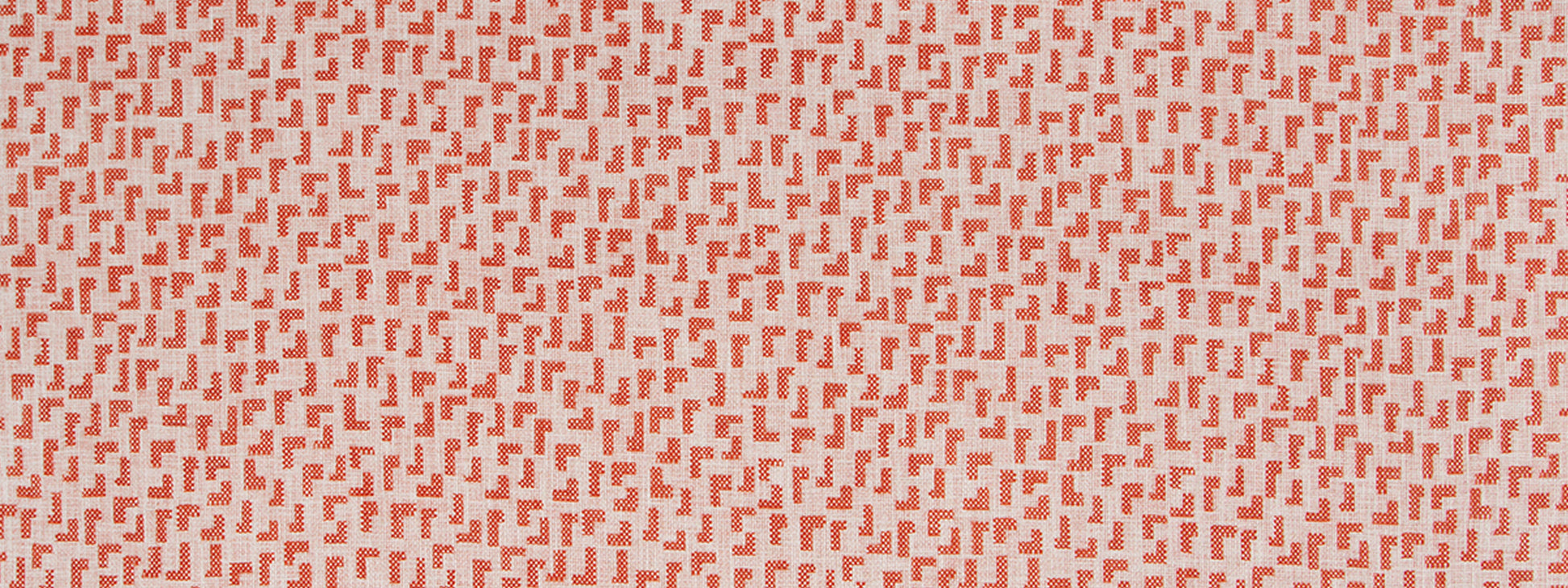 Red geometric print on pale pink fabric with tiny L-shaped motifs in a repeating pattern.
