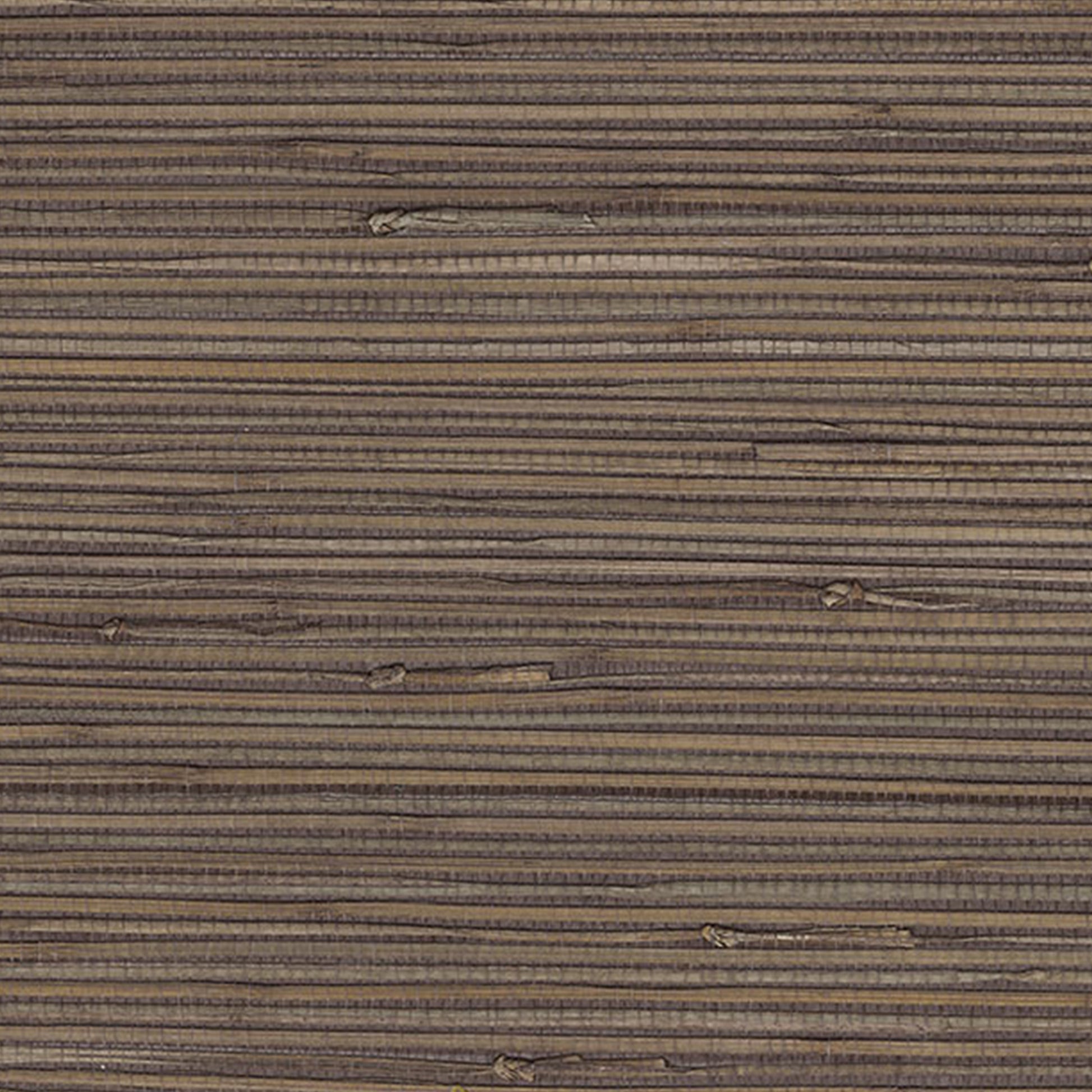 Warm brown grasscloth wallpaper with visible woven fibers.