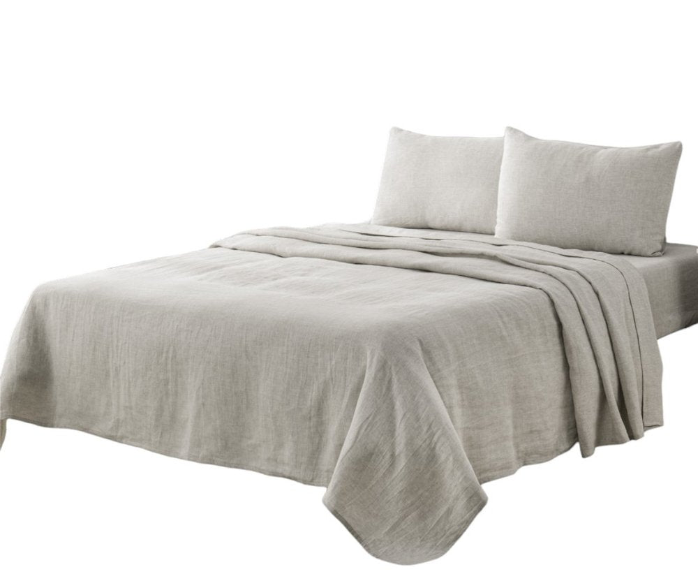 Light gray linen California King sheet set on a simple bed, with flat sheet and two pillowcases visible.