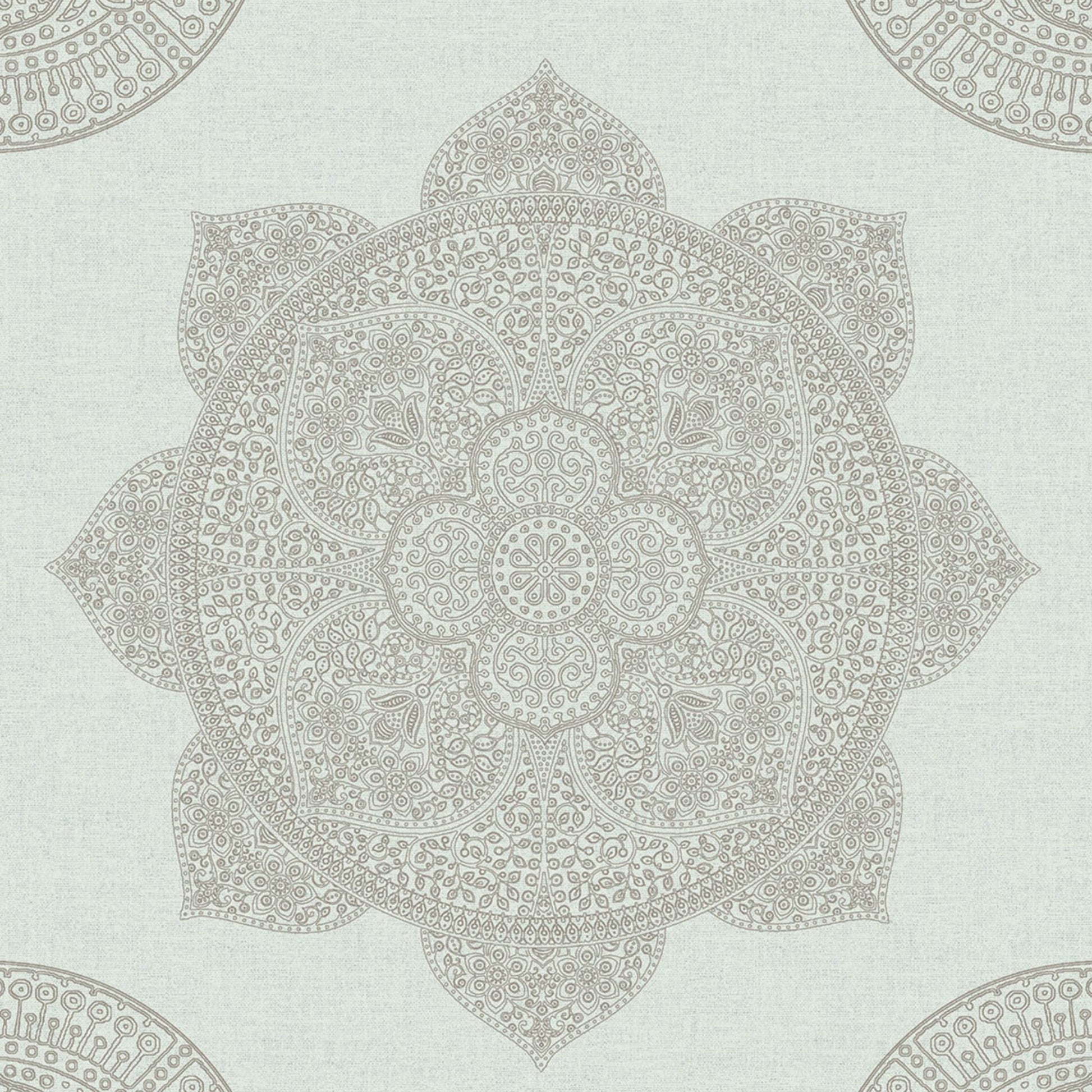 Soft blue backdrop featuring an intricate beige mandala medallion and floral filigree, decorative wallpaper pattern.