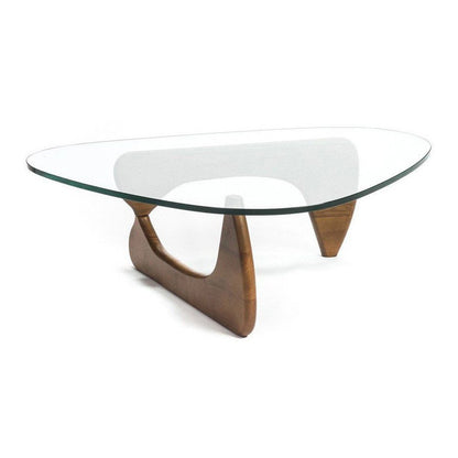 Oval clear glass tabletop over a sculptural walnut wood base, mid-century modern coffee table.