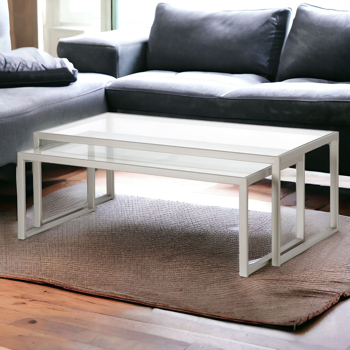 Set of Two 46" Silver Glass And Steel Nested Coffee Tables