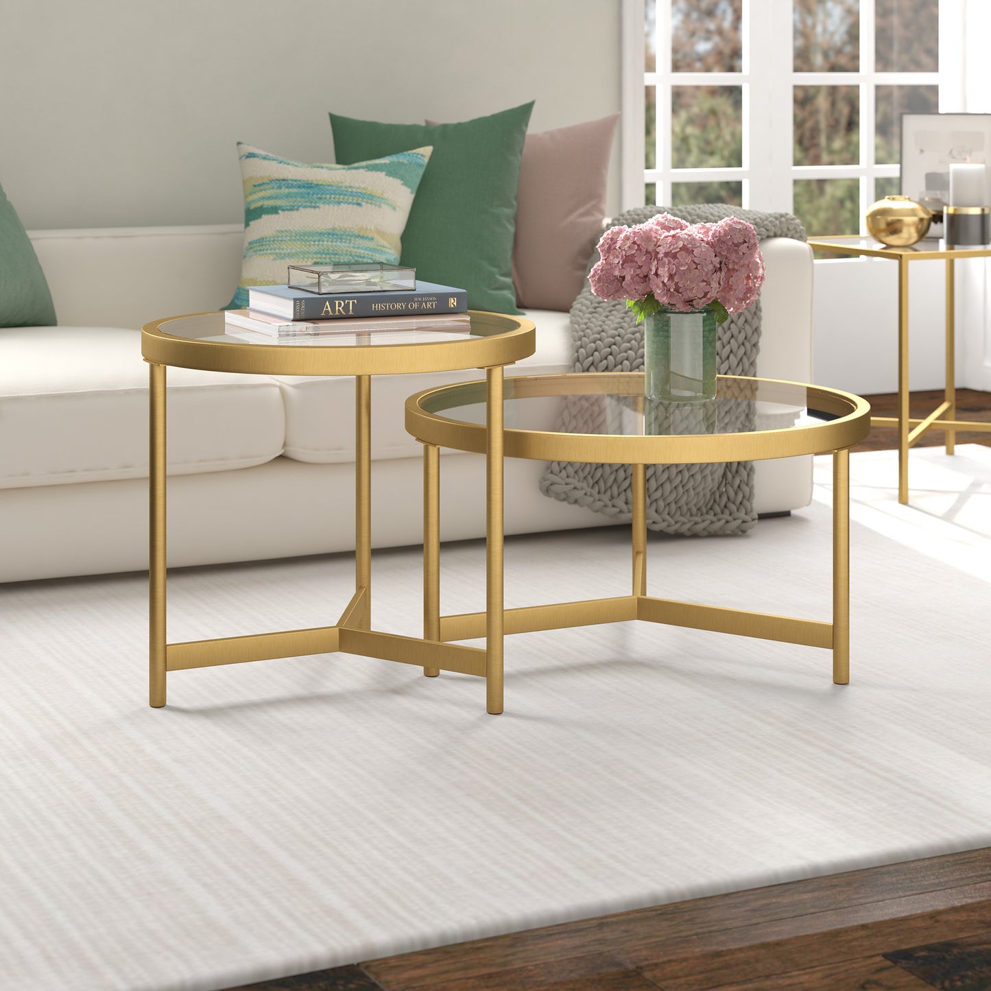 Set of Two 30" Clear And Gold Glass And Steel Round Nested Coffee Tables