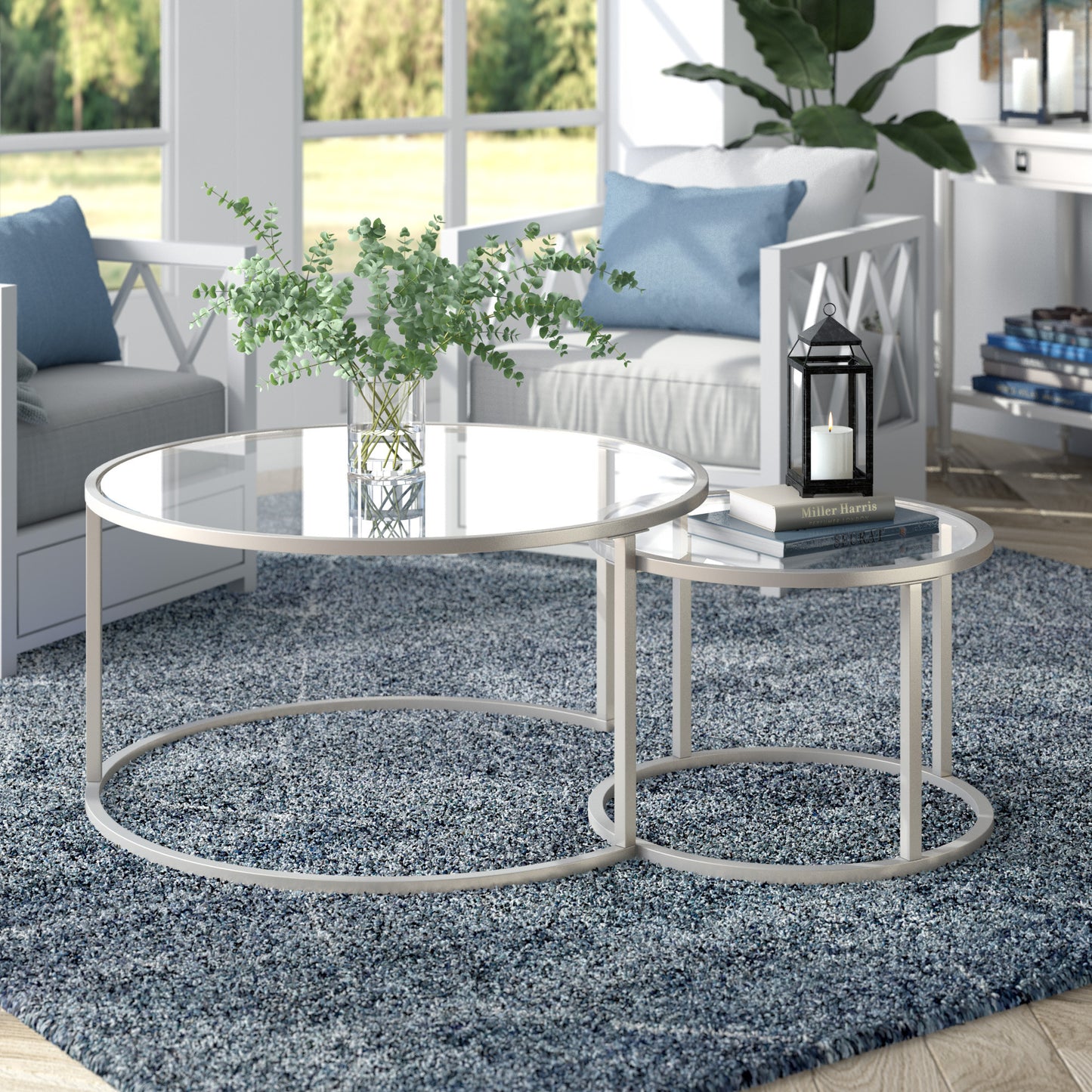 Set of Two 35" Silver Glass And Steel Round Nested Coffee Tables