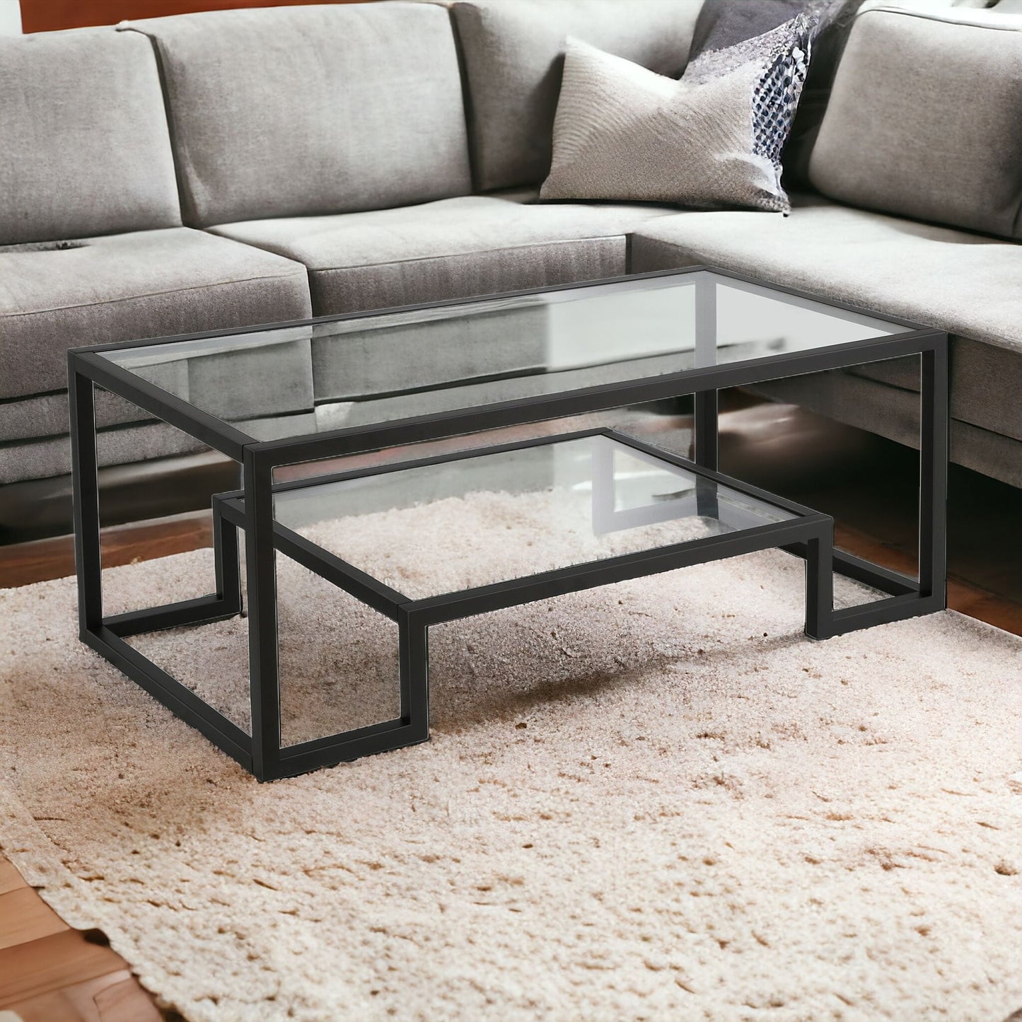 45" Clear And Black Glass And Steel Coffee Table With Shelf