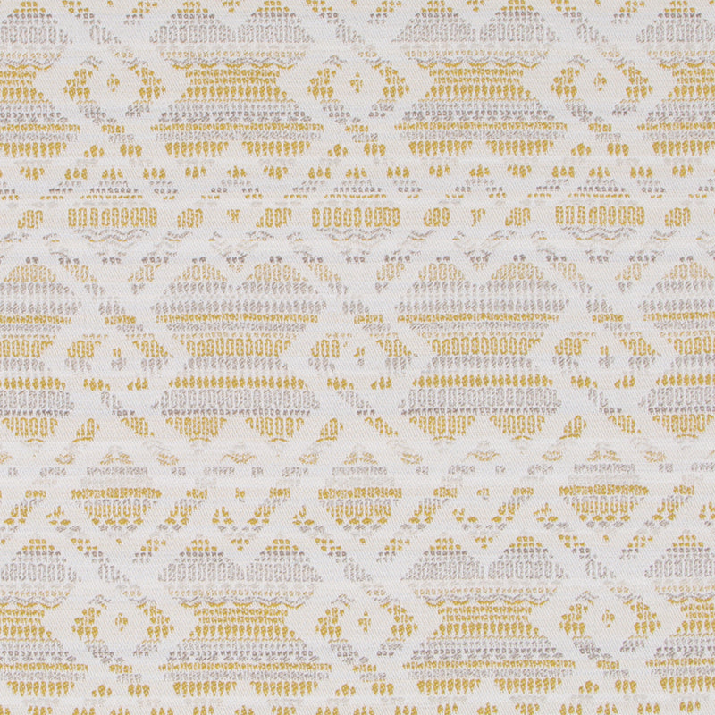 Citron upholstery fabric with a gold lace-like geometric lattice pattern featuring diamond shapes and chevrons.