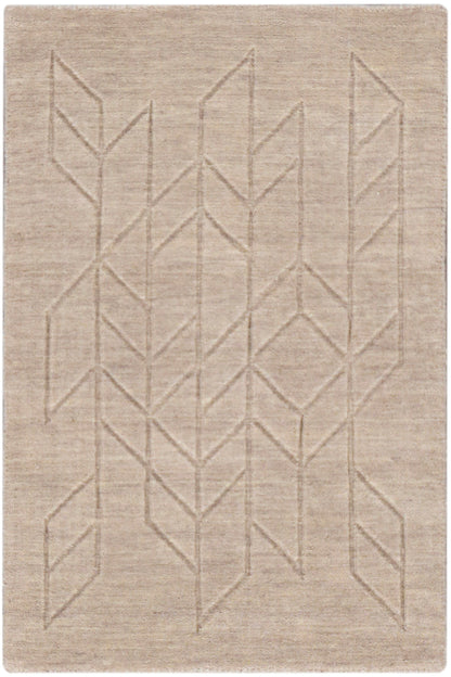 Beige flat-weave rug with a subtle tonal geometric leaf pattern and soft texture.