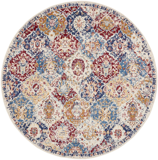 Round Persian-style rug with ornate floral medallions in navy, burgundy, ivory & gold; distressed vintage finish.
