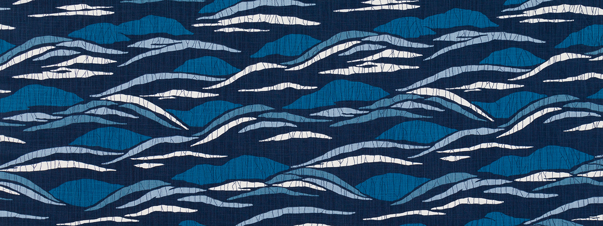 Navy blue fabric with white and light-blue wavy stripes in a repeating, sea-inspired pattern.