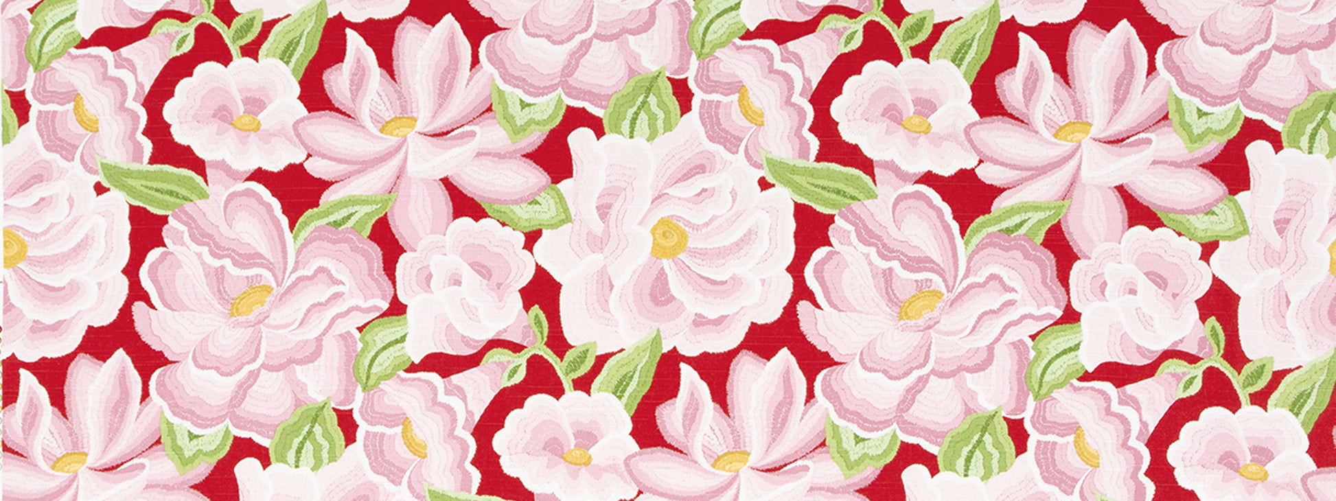 Vibrant floral fabric with pink blossoms and green leaves on a bold red background; floral print.