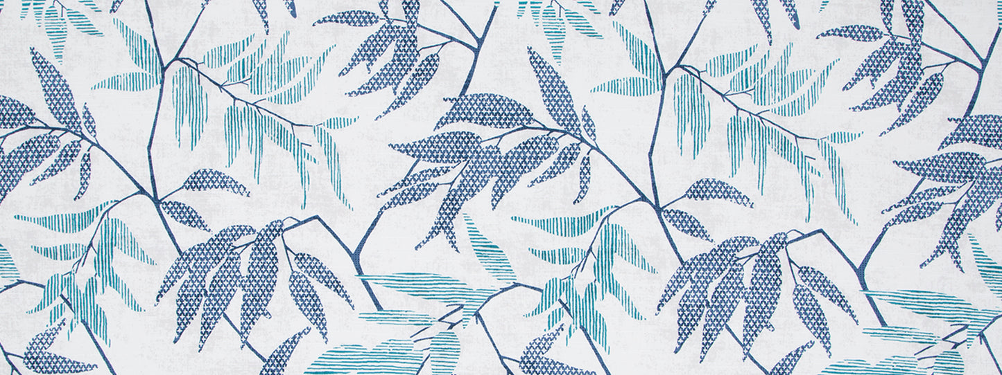 Blue and teal leafy botanical print on white background; textile fabric pattern.