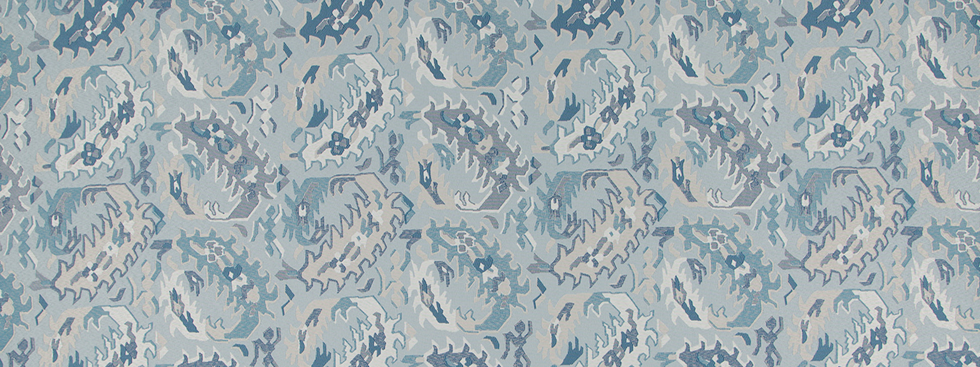 Repeating pale blue fabric pattern with medium blue botanical/scroll motifs across a light-blue background