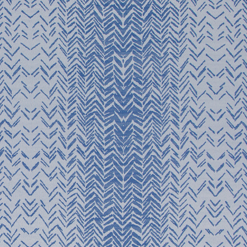 Blue chevron pattern fabric with alternating light and dark blue zigzags; suitable for drapery.