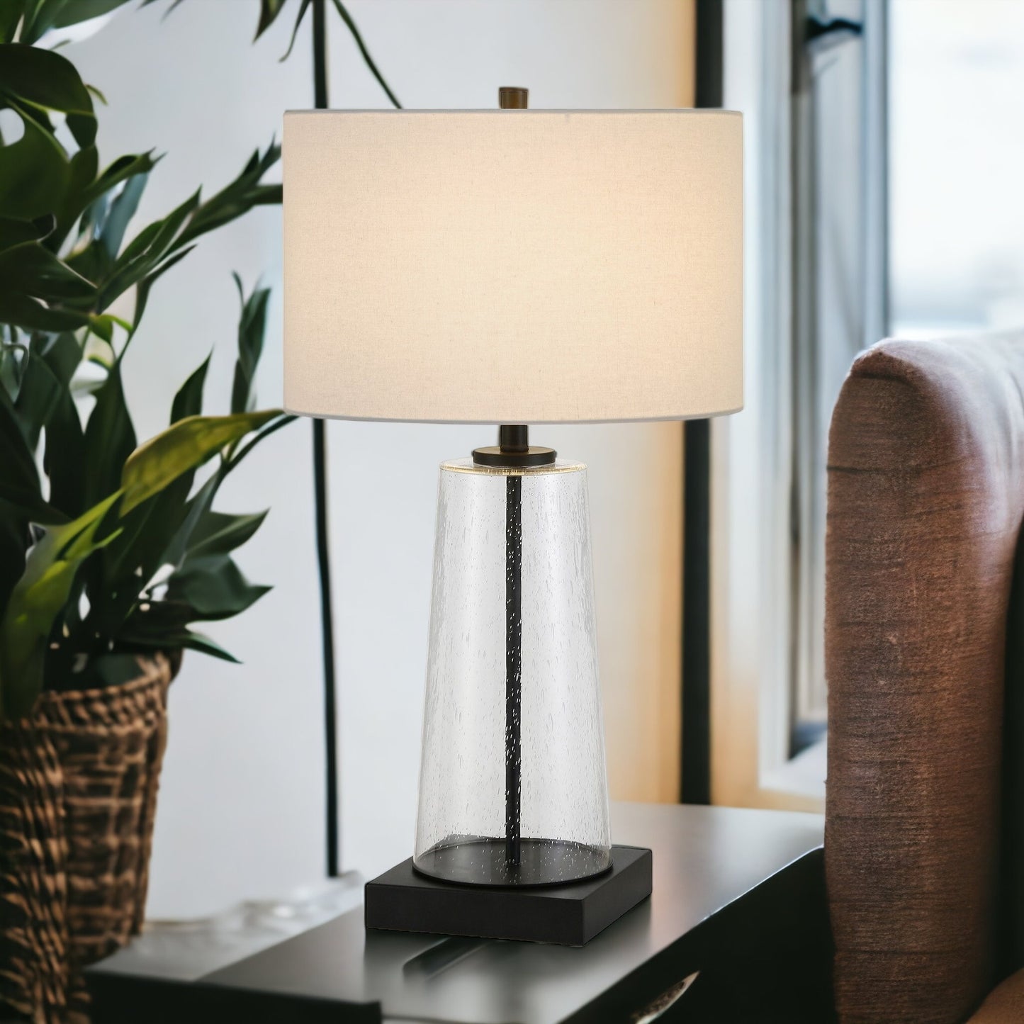 27" Black and Clear Metal and Glass Table Lamp With White Drum Shade