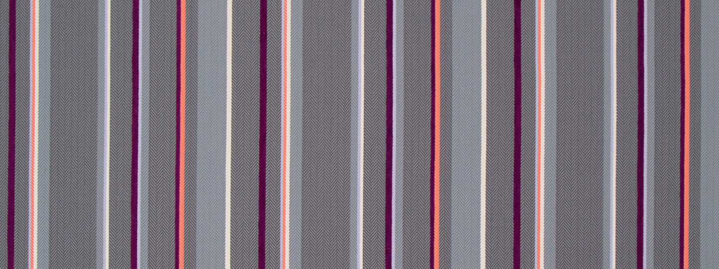 Vertical multicolor striped fabric in purple, gray, pink and orange with a subtle woven texture.