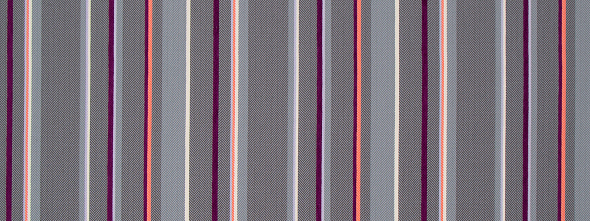 Vertical multicolor striped fabric in purple, gray, pink and orange with a subtle woven texture.