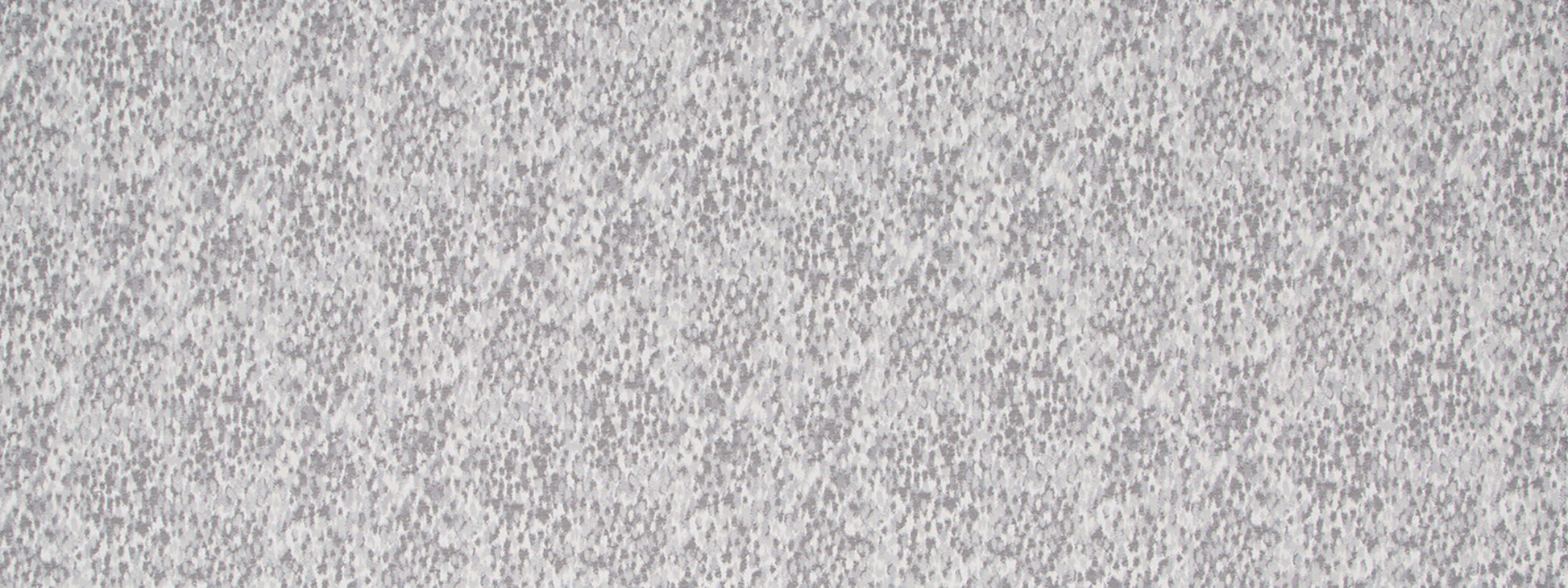 Pewter upholstery fabric with a gray speckled texture and tiny black and white flecks.
