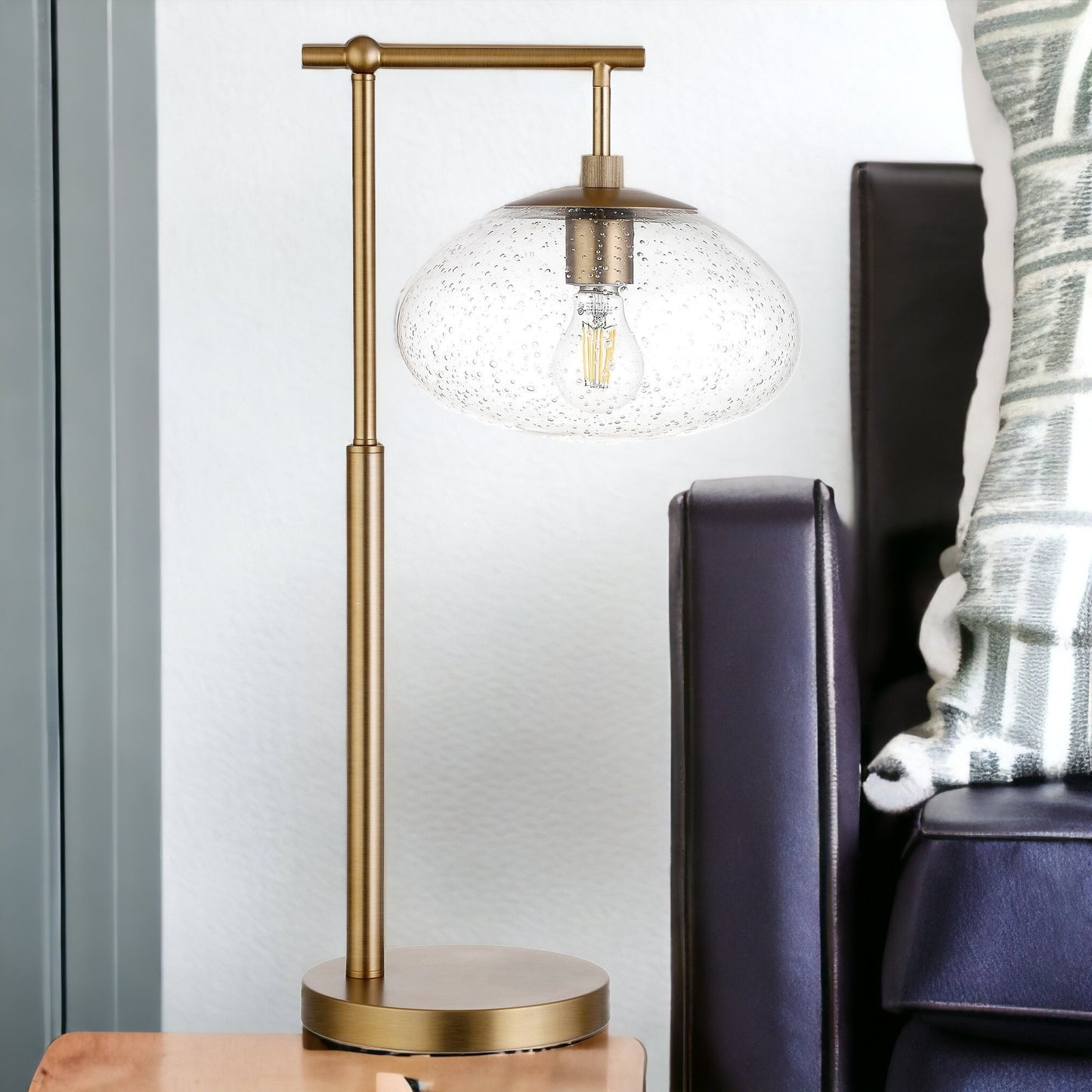 25" Brass Metal Arched Table Lamp With Clear Seeded Globe Shade