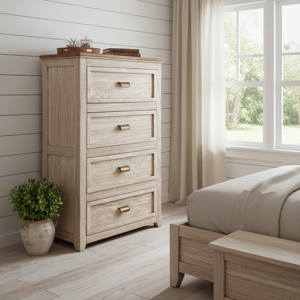 Cream solid wood four-drawer chest with brass pulls in a bright, airy bedroom with shiplap walls and a bed nearby.