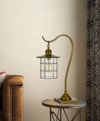 25" antiqued brass metal lantern desk lamp with an antiqued brass drum shade.