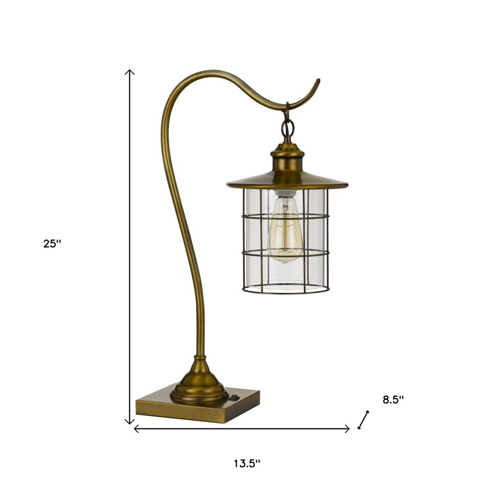 25" antiqued brass metal lantern desk lamp with an antiqued brass drum shade