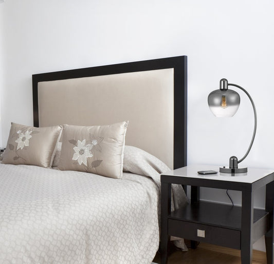 27" gunmetal metal table lamp with a silver metallic globe shade.