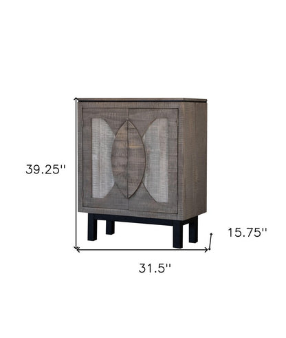 Dark brown woven rattan cabinet on black legs, arched front doors; rustic boho media storage 39.25H x 31.5W x 15.75D