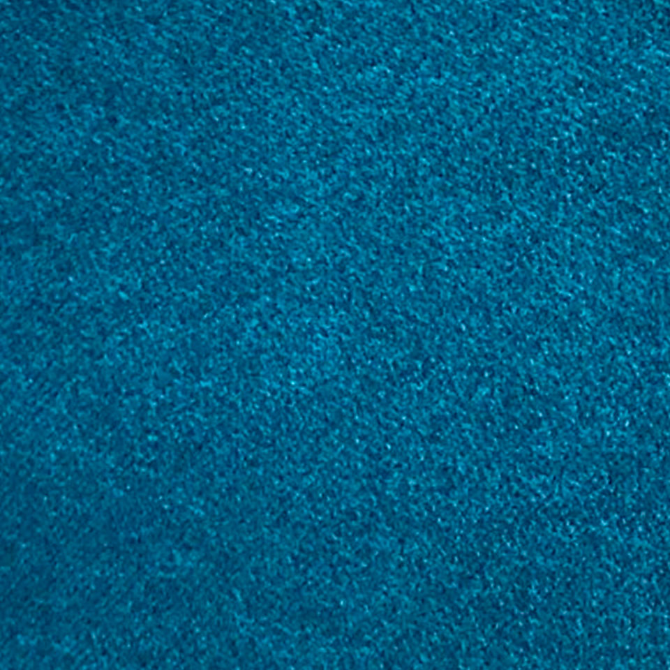Close-up of teal velvet upholstery fabric with a soft, plush pile and subtle sheen.