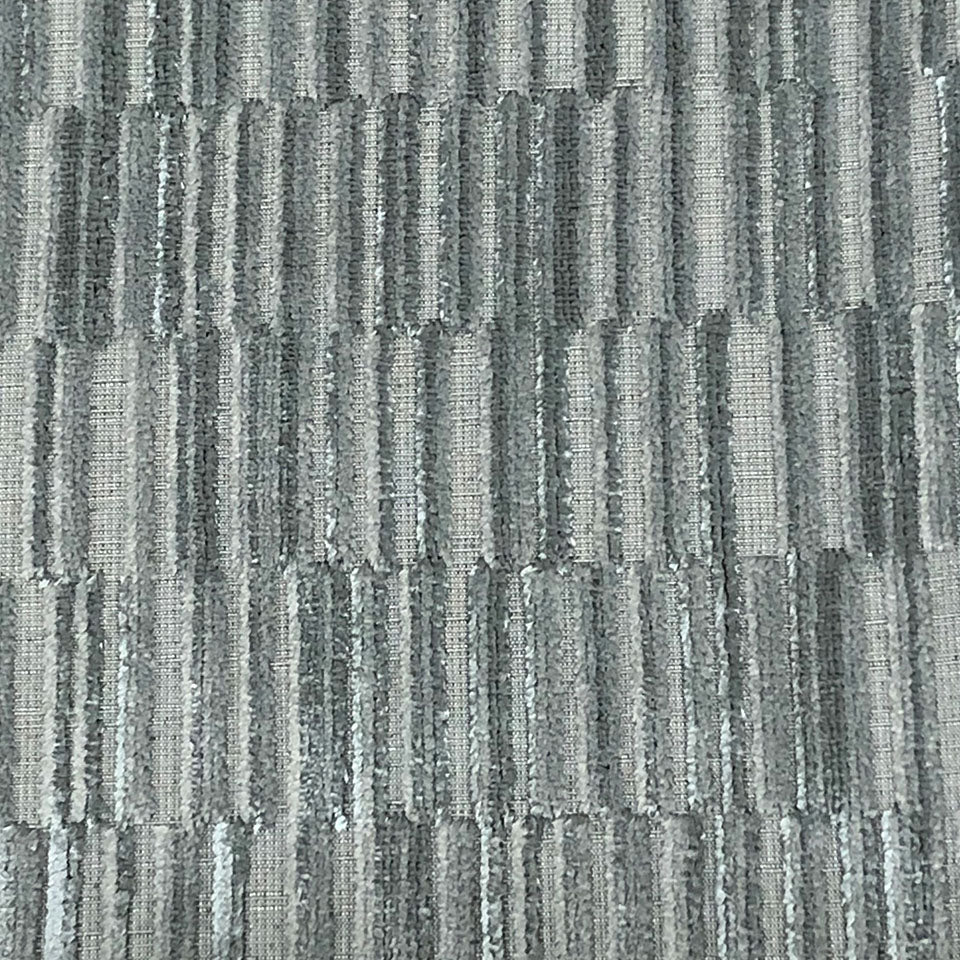 Grey-green textured rug with vertical ribbed stripes & loop-pile texture, modern industrial style.