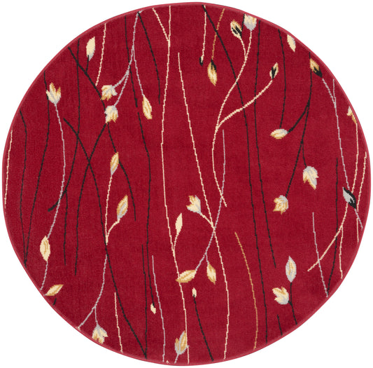 Round red area rug with black and white vine lines and small beige leaf accents, modern botanical style.