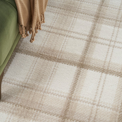 Beige plaid round rug.