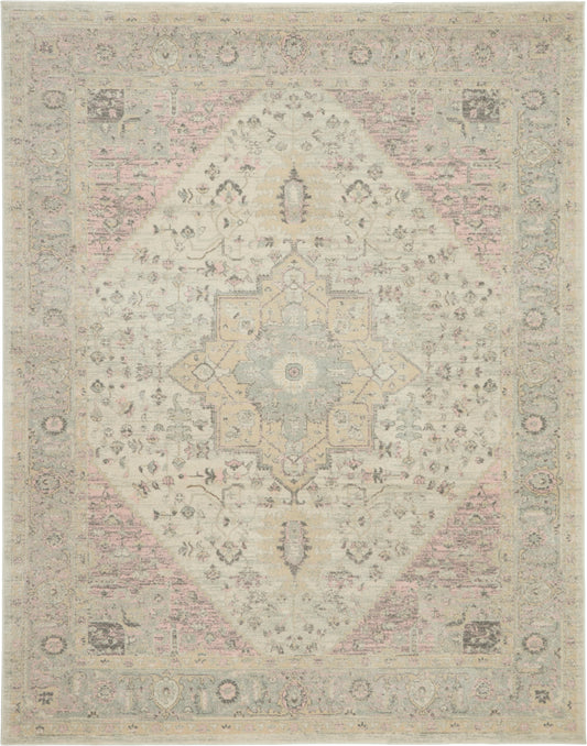 Pastel distressed oriental rug with a central diamond medallion, ivory and pale pink-blue tones, and ornate floral border.