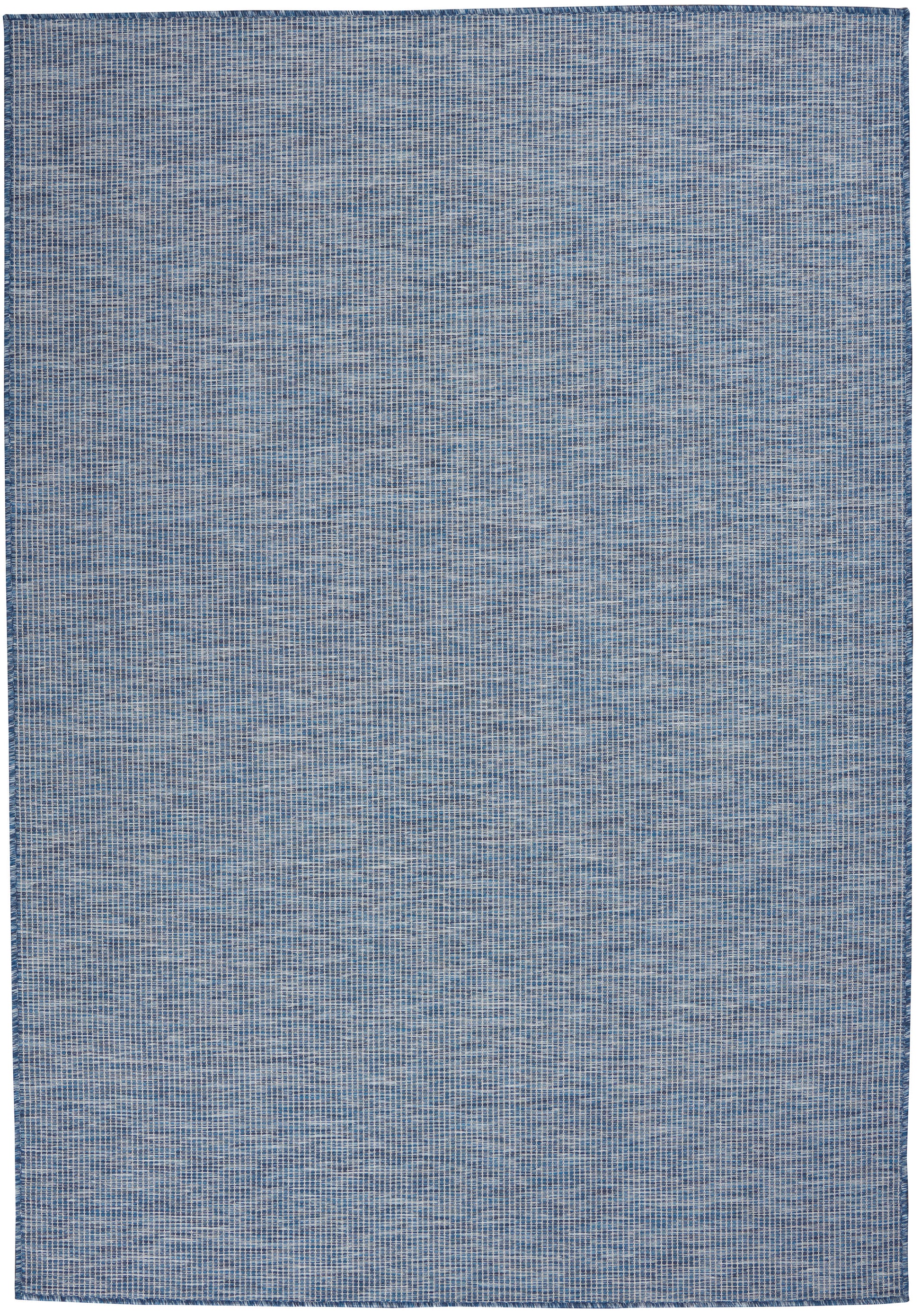 Blue denim-toned woven rug, rectangular with subtle textured grid pattern; casual, contemporary living room accent.