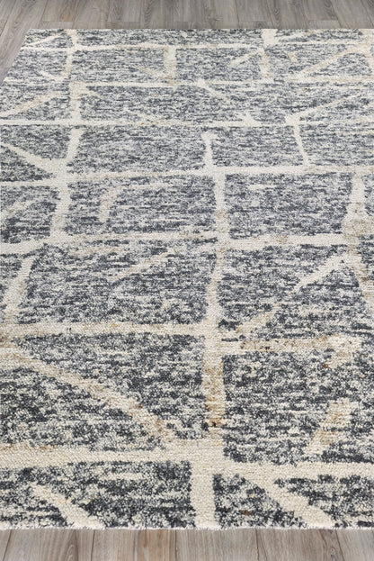 Rectangular gray rug with cream lattice grid pattern; plush textured pile for modern living spaces.