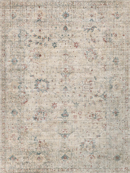 Beige distressed oriental area rug with faded red and blue floral motifs.