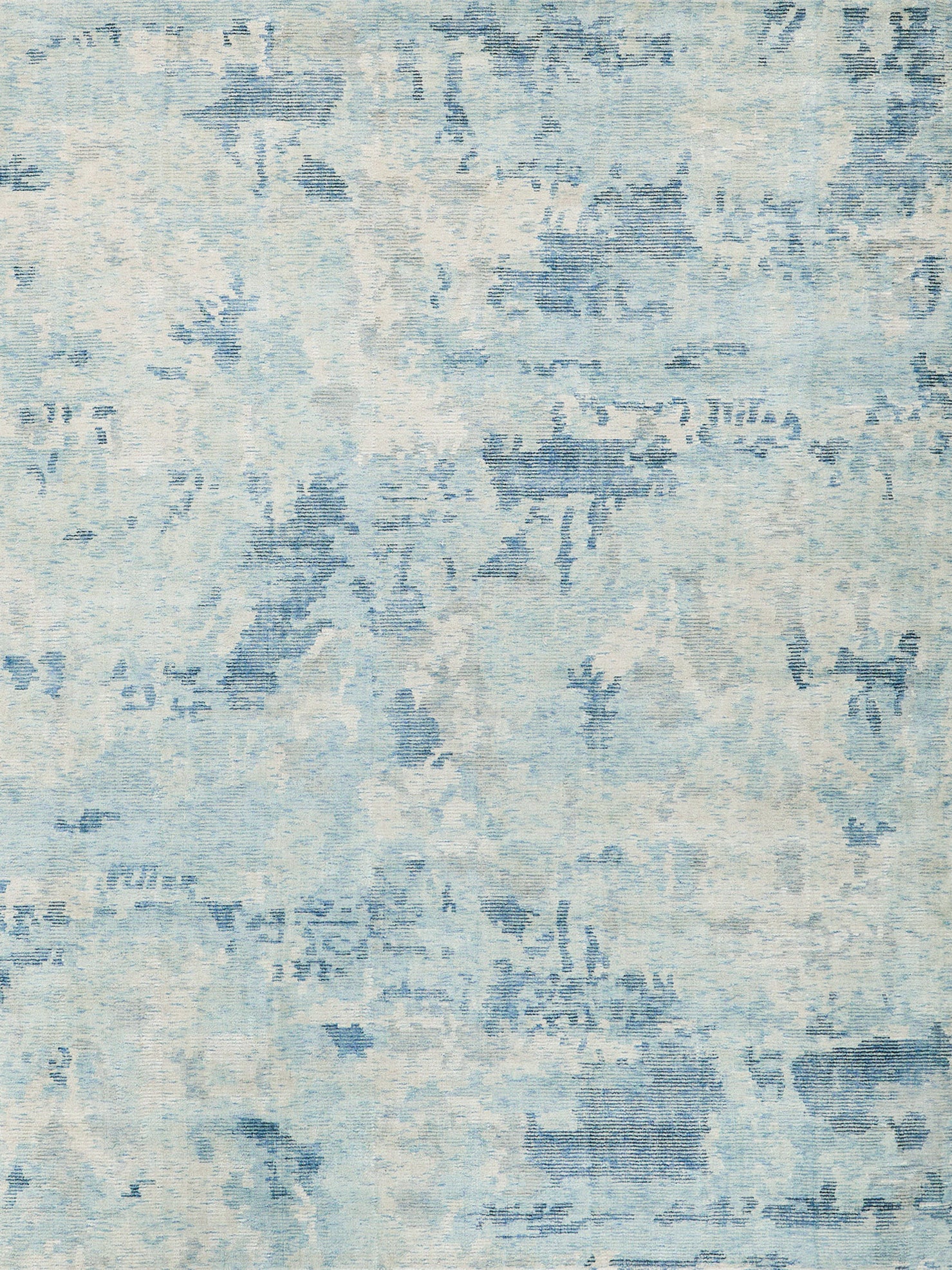 Blue and ivory abstract area rug with a washed, distressed pattern; hand loomed indoor rug, 6' x 9', suitable for living room or bedroom.