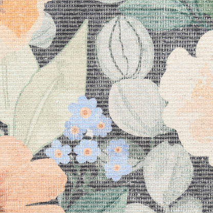 Tapestry-style woven floral fabric with peach, cream and blue blossoms and green leaves on a dark textured background.