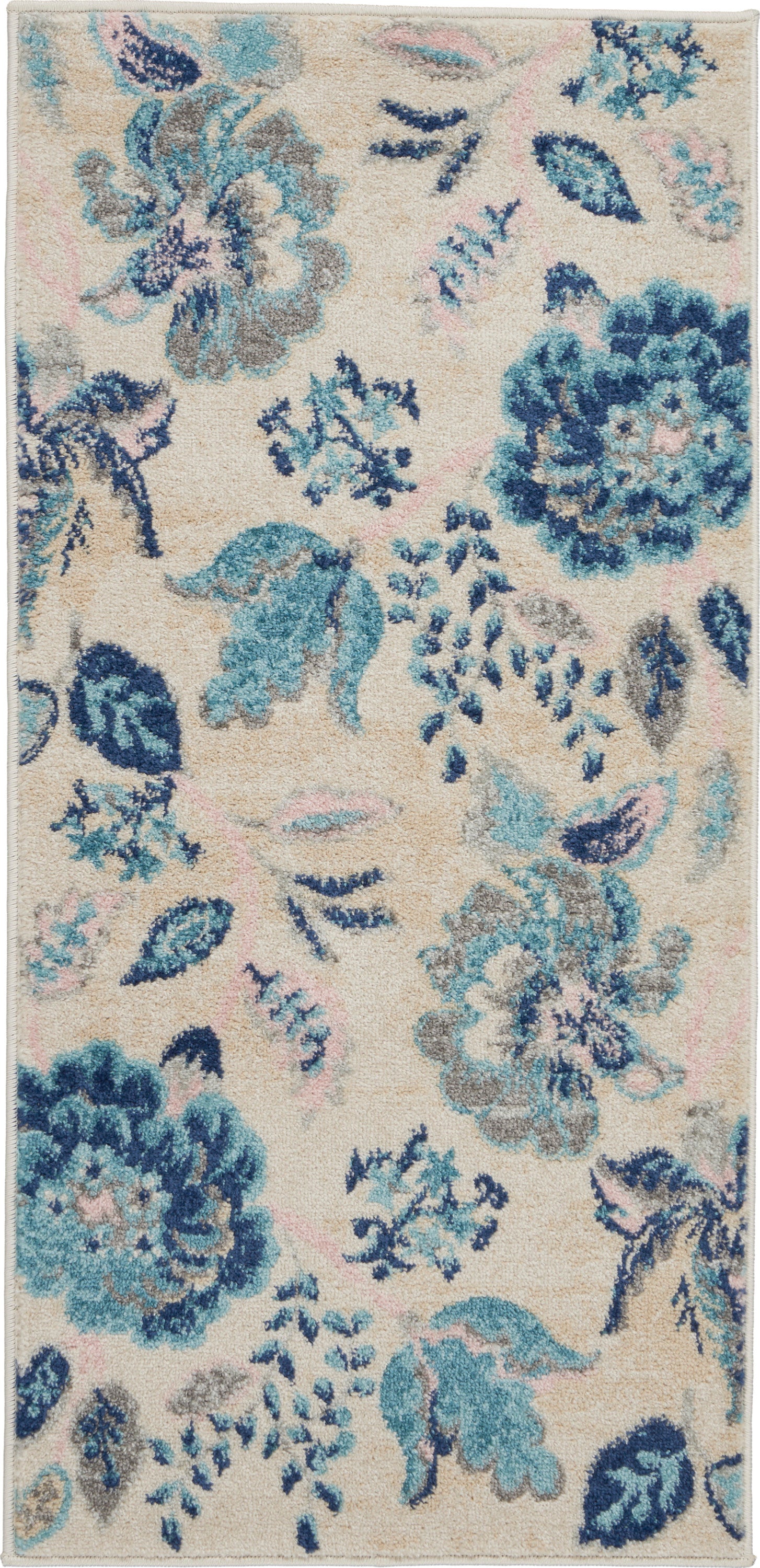 Rectangular plush area rug with beige background and blue-teal floral pattern; soft tufted pile ideal for living room decor.