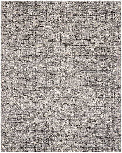 Rectangular rug with a muted gray-beige abstract, distressed pattern.