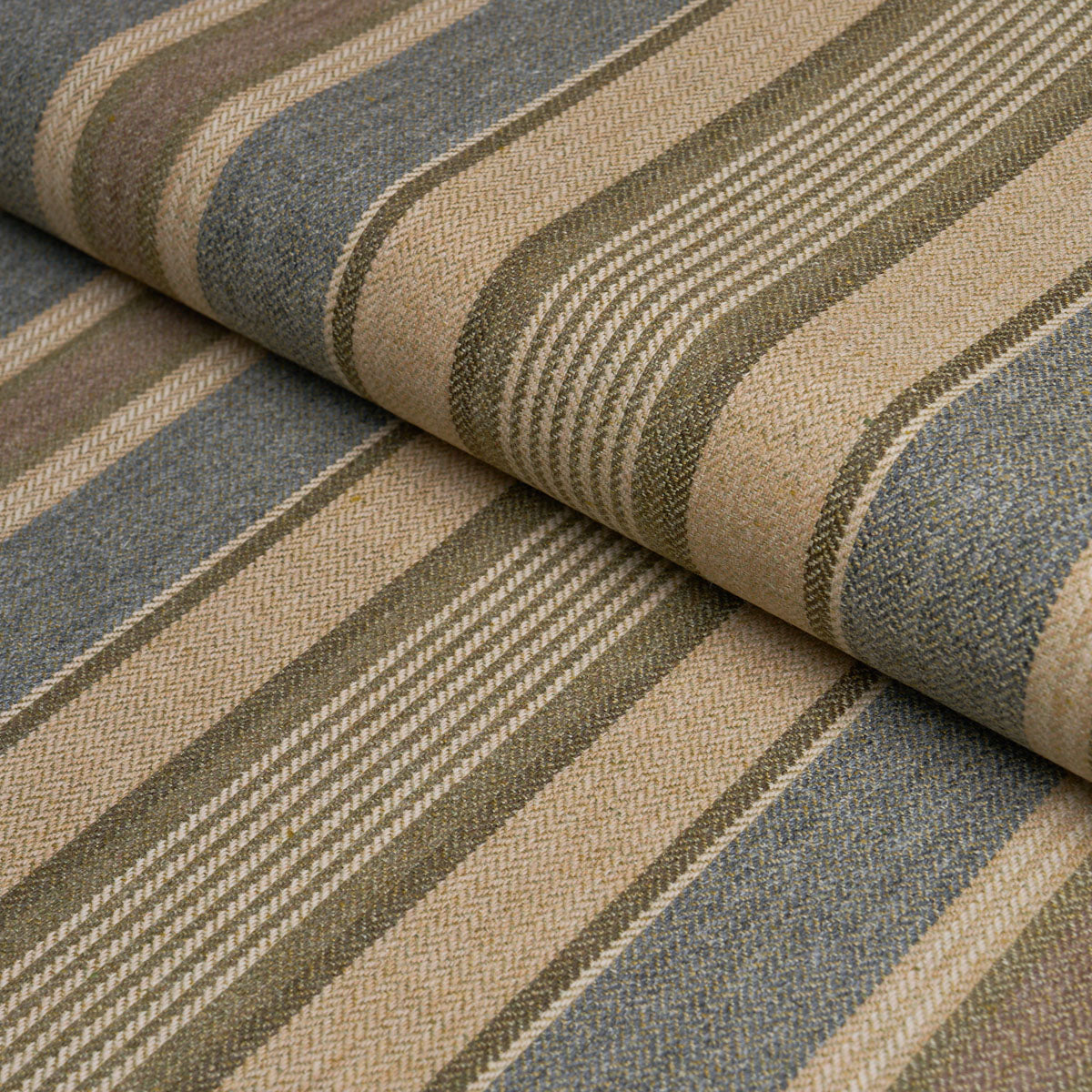 Rolled striped woven fabric in beige, taupe and gray tones with textured, upholstery-style stripes.