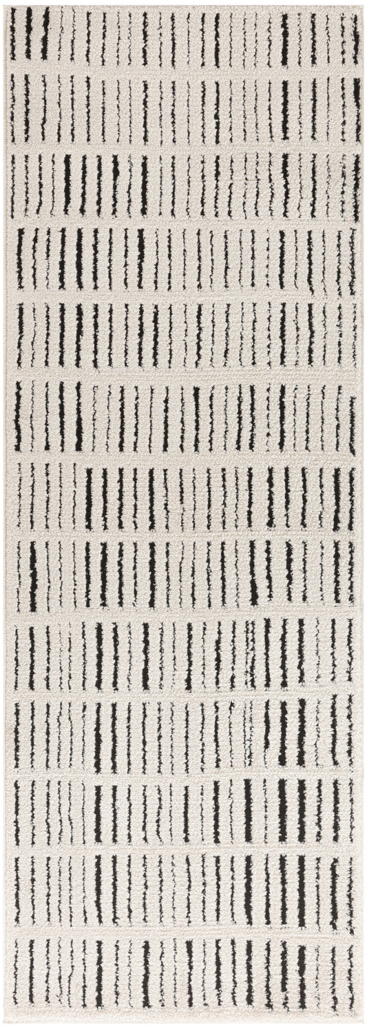 Beige textured runner rug with vertical black brushstroke stripes in a modern geometric pattern.