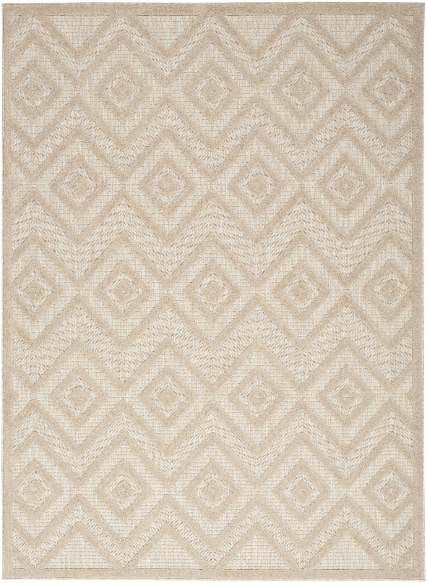 Beige woven rug with repeating diamond and chevron geometric pattern in light tan tones.