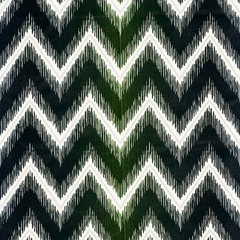 Peacock-colored velvet fabric with a shock-wave cut velvet pattern.
