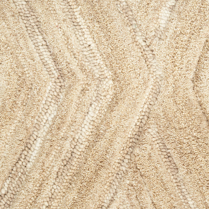 Beige textured rug with soft loop pile & subtle chevron wave pattern.