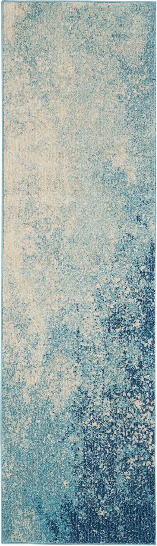 Blue abstract rug runner with cream speckles, teal to navy gradient and distressed texture.