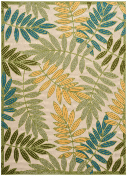 Woven rug featuring blue, olive green and mustard fern leaves on a cream background; botanical pattern.
