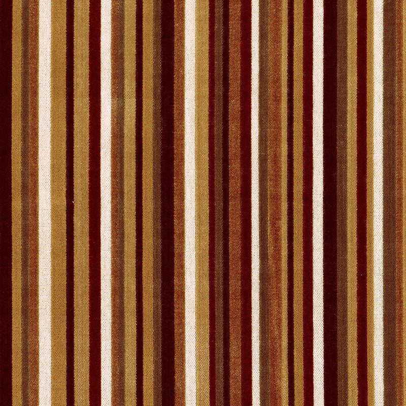Earth-toned vertical striped rug in caramel, tan, cream and chocolate brown hues with a plush woven texture.